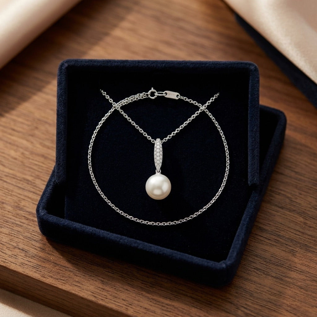 Pearl And Diamond Bale Pendant In 14k White Gold 1/12ctw — velvet box