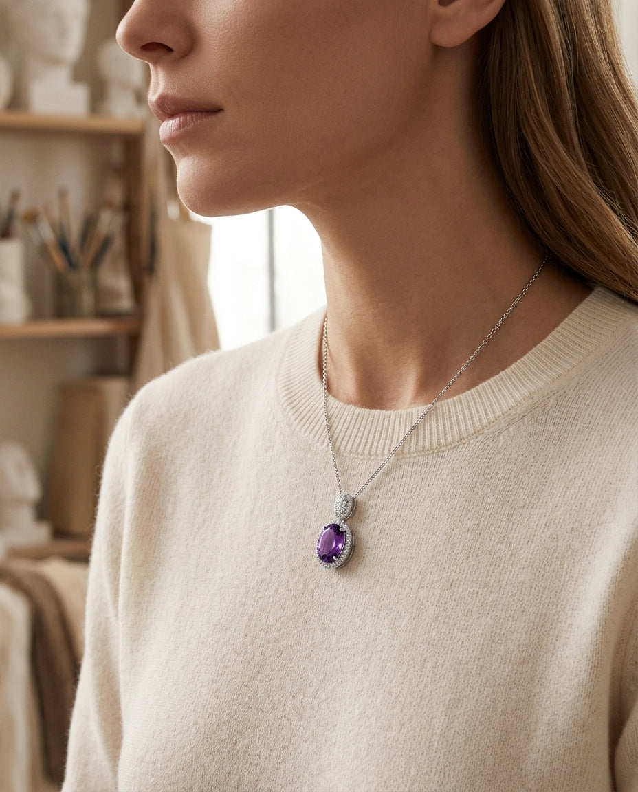 Oval Amethyst And Diamond Halo Pendant In 14k White Gold — editorial close-up