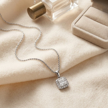 Blue Sapphire Asscher Halo Pendant in 14k White Gold 17-Inch Chain — textile flat lay