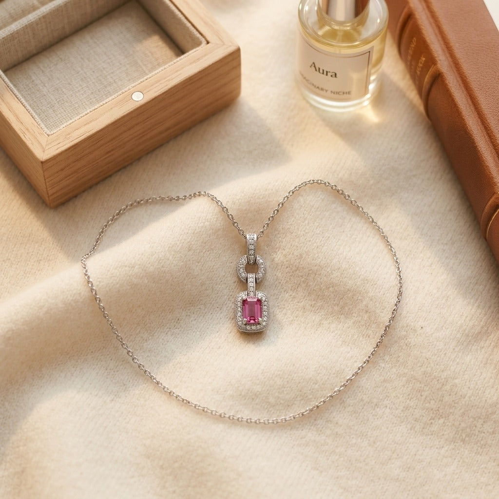 Pink Sapphire And Diamond Mini Doorknocker Pendant In 14k White Gold (6x4mm Center) — textile flat lay