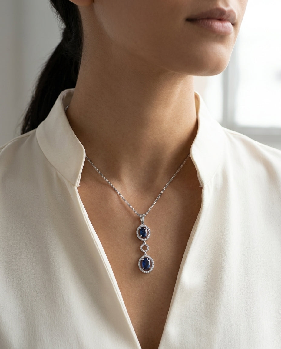 Sapphire And Diamond Oval Drop Pendant In 14k White Gold (17-in Wheat Chain) — editorial close-up