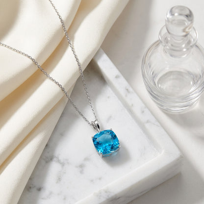Blue Topaz Solitaire Pendant In 14k White Gold — atelier still life
