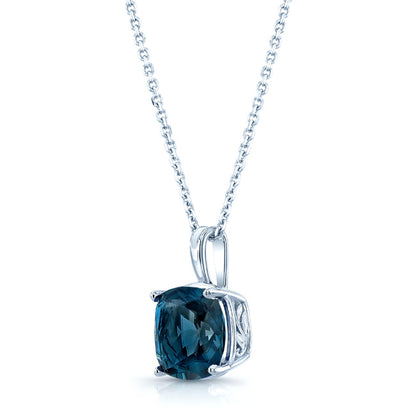Blue Topaz Pendant In 14k White Gold