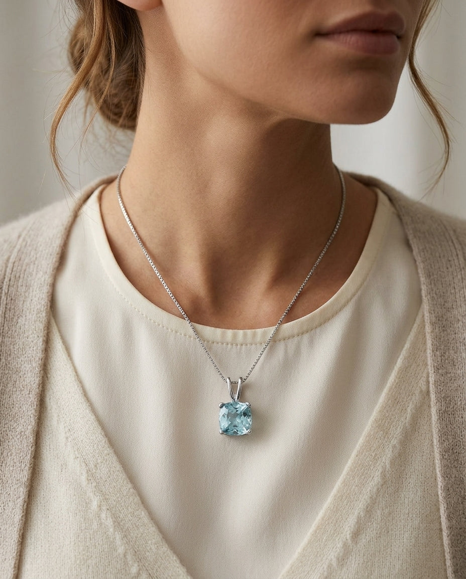 Aquamarine Solitaire Pendant In 14k White Gold — editorial close-up