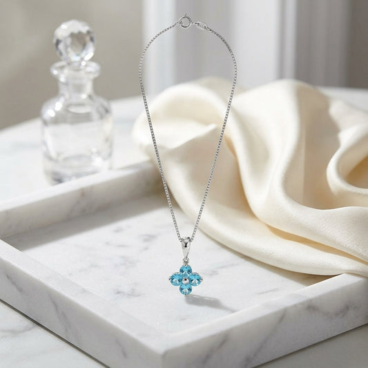 Blue Topaz Floral Pendant In 14k White Gold — atelier still life