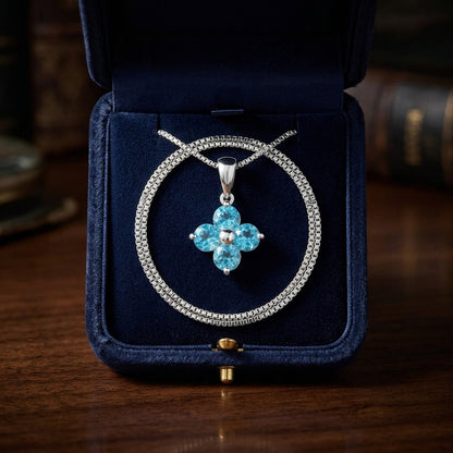 Blue Topaz Floral Pendant In 14k White Gold — gift presentation