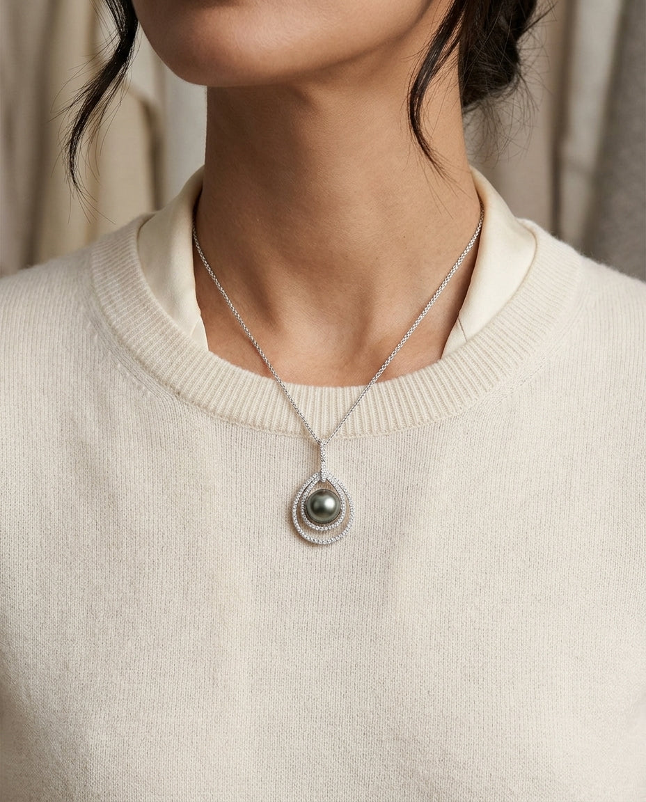 Black Tahitian Pearl & Diamond Pendant In 14k White Gold — editorial close-up