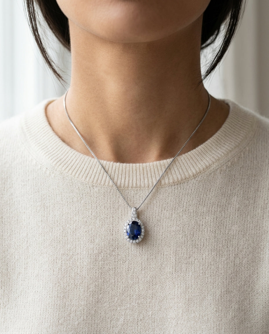 Sapphire And Diamond Pendant In 14k White Gold (1/5 Ct.tw.) — editorial close-up