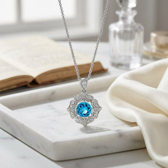 Blue Topaz And Diamond Floral Pendant In 14k White Gold — atelier still life