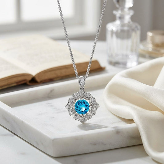 Blue Topaz And Diamond Floral Pendant In 14k White Gold — atelier still life