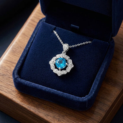 Blue Topaz And Diamond Floral Pendant In 14k White Gold — gift presentation