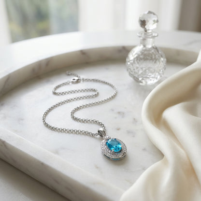 Oval Swiss Blue Topaz & Diamond Pendant In 14k White Gold — atelier still life