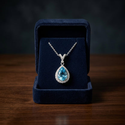 Blue Topaz And Diamond Pear-shape Halo Pendant With Split Bail In 14k White Gold — gift presentation