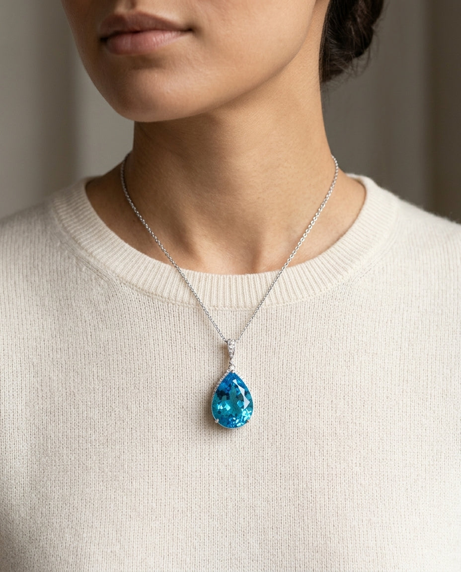 Blue Topaz Teardrop Pendant With Diamond Crest In 14k White Gold (18x13mm Center) — editorial close-up