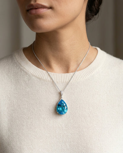 Blue Topaz Teardrop Pendant With Diamond Crest In 14k White Gold (18x13mm Center) — editorial close-up