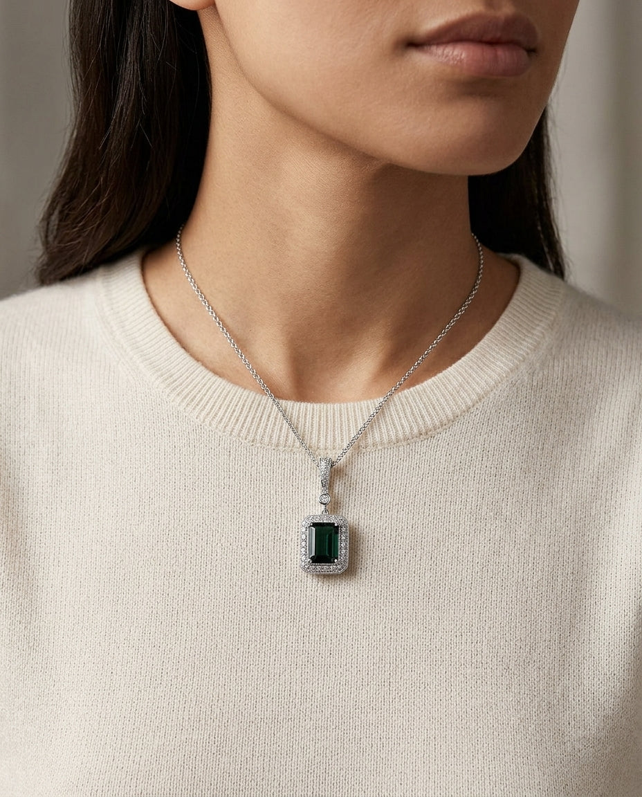 Green Tourmaline And Diamond Emerald Cut Halo Dangle Pendant In 14k White Gold (8x6mm Center) — editorial close-up