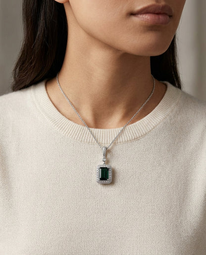 Green Tourmaline And Diamond Emerald Cut Halo Dangle Pendant In 14k White Gold (8x6mm Center) — editorial close-up