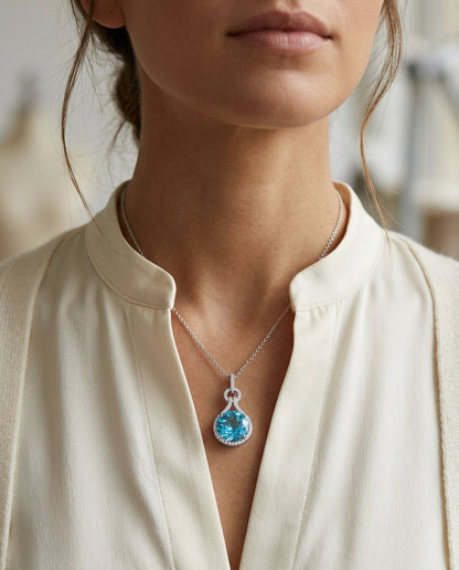 Blue Topaz And Diamond Doorknocker Pendant In 14k White Gold (10mm Round Center) — editorial close-up