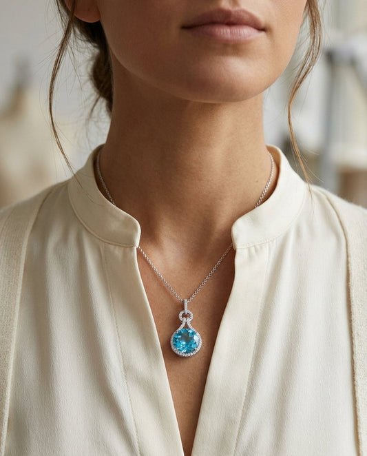 Blue Topaz And Diamond Doorknocker Pendant In 14k White Gold (10mm Round Center) — editorial close-up