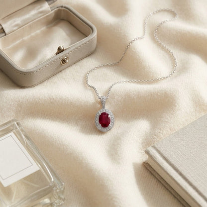 Ruby And Diamond Pendant In 14k White Gold (1/6 Ct. Tw,) — textile flat lay
