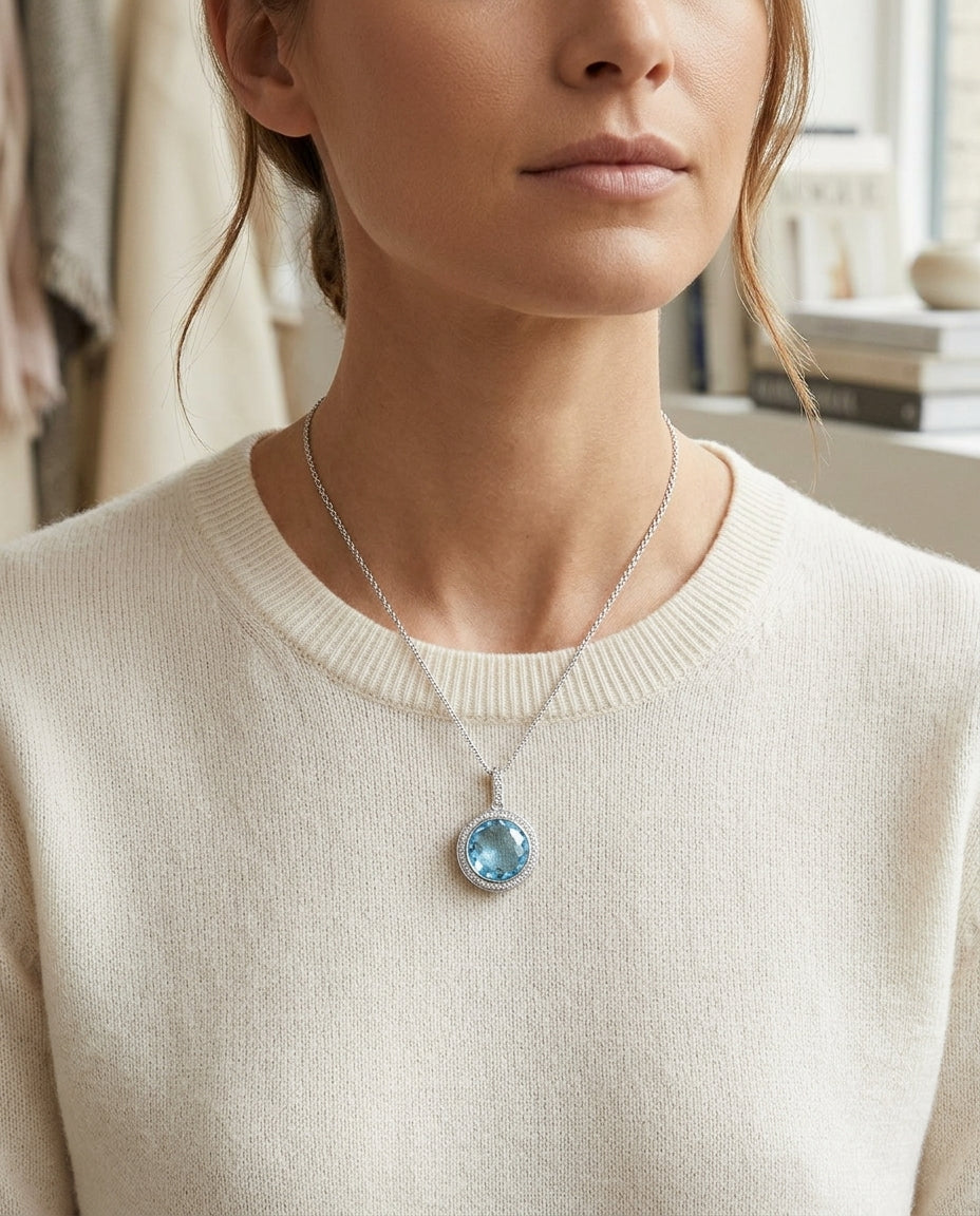 Blue Topaz And Diamond Round Checkerboard Halo Pendant In 14k White Gold — editorial close-up