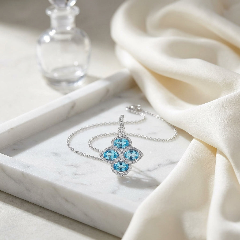Blue Topaz And Diamond Oval Cluster Flower Pendant In 14k White Gold (6x4mm) — atelier still life