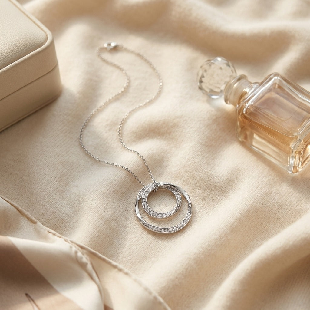Diamond Double Loop Circle Pendant In 14k White Gold 1/2ctw — textile flat lay