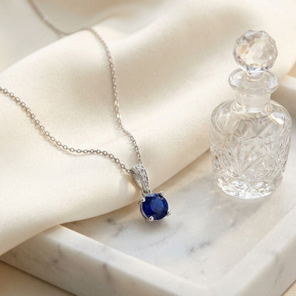 Sapphire Round Solitaire Pendant With Diamond Bail In 14k White Gold (17-in Curb Chain) — marble silk