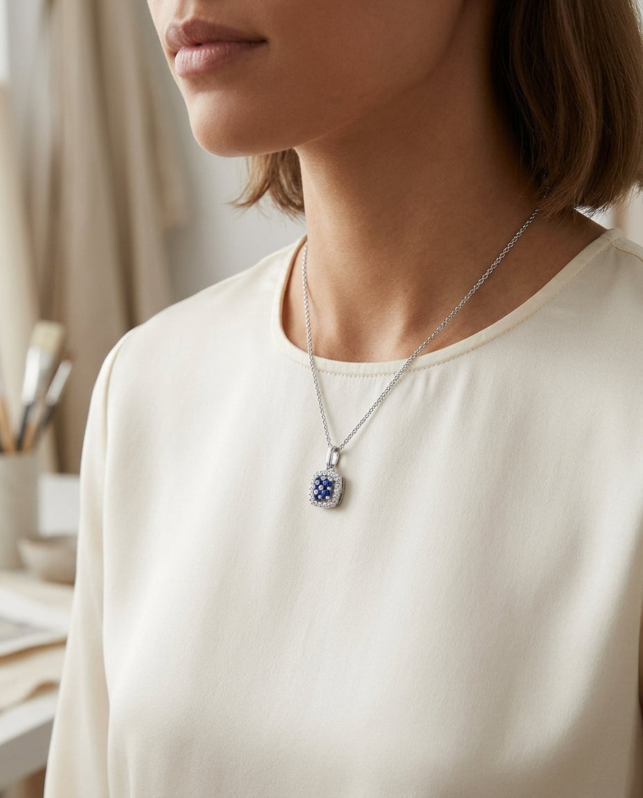 Sapphire And Diamond Floral Pendant In 14k White Gold — editorial close-up