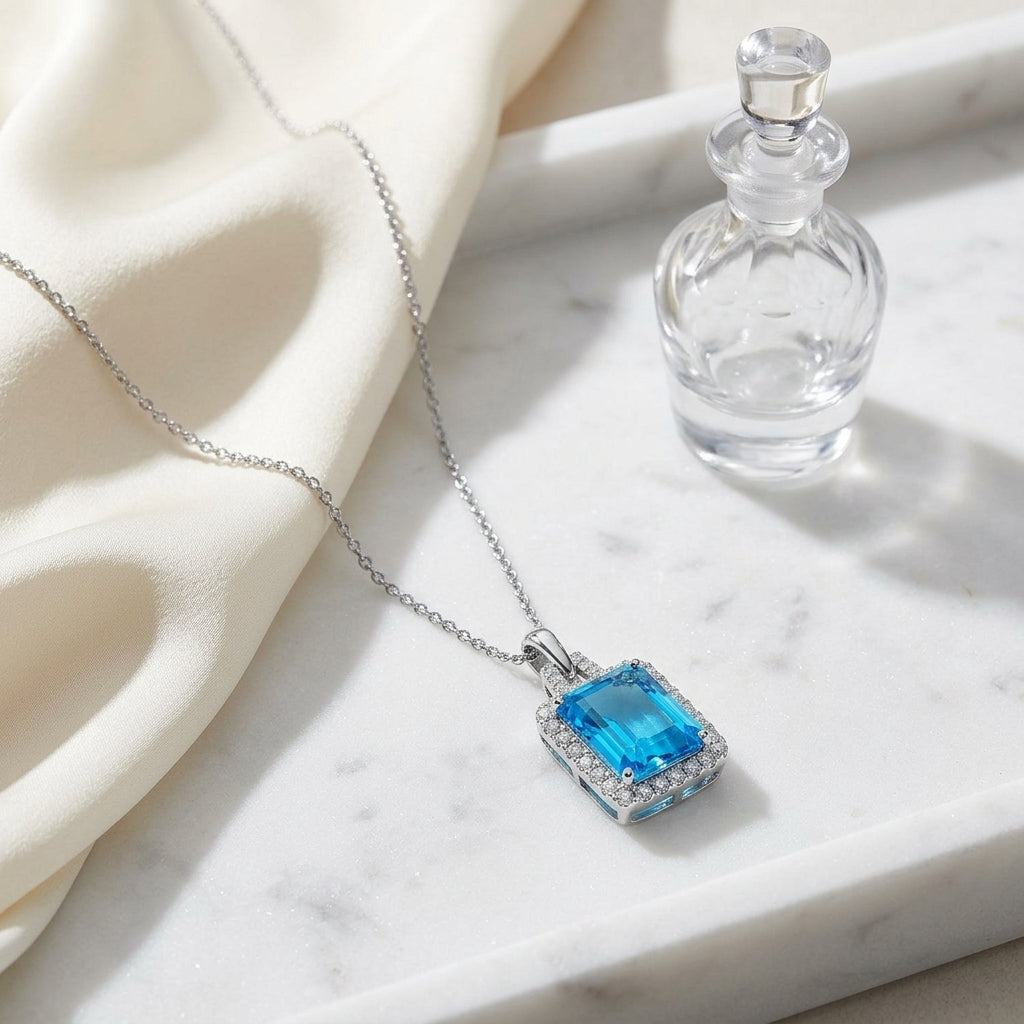 Swiss Blue Topaz And Diamond Halo Pendant With Trapezoid Bail In 14k White Gold — atelier still life