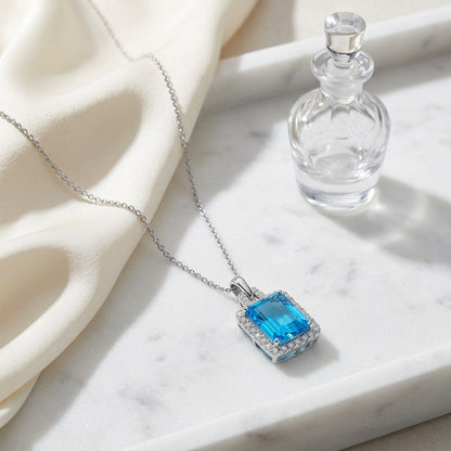 Swiss Blue Topaz And Diamond Halo Pendant With Trapezoid Bail In 14k White Gold — atelier still life