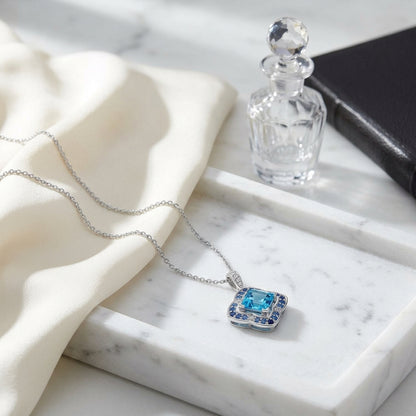 Swiss Blue Topaz, Sapphire And Diamond Pendant In 14k White Gold — atelier still life