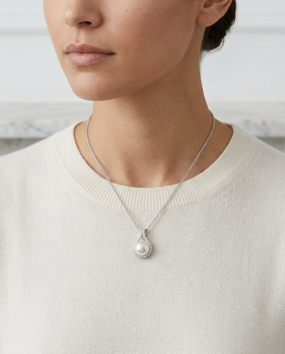 Fresh Water Pearl And Diamond Halo Pendnat In 14k White Gold — editorial close-up