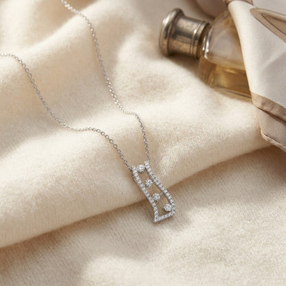 Diamond Floating Pendant in 14k White Gold — textile flat lay