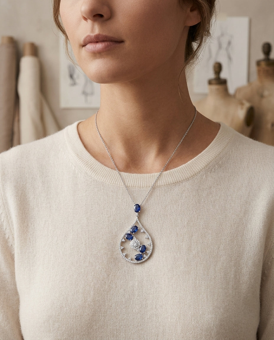 Sapphire And Diamond Cascade Tear Drop Pendant In 14k White Gold (si) — editorial close-up