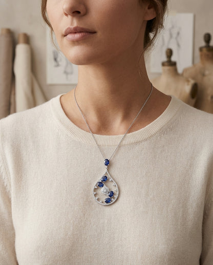 Sapphire And Diamond Cascade Tear Drop Pendant In 14k White Gold (si) — editorial close-up