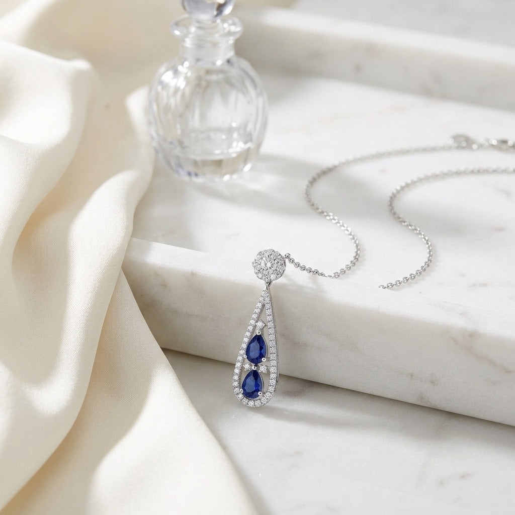 Sapphire And Diamond Tear Drop Pendant In 14k White Gold (si) — atelier still life