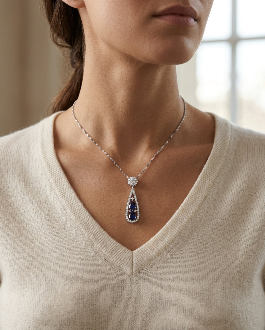 Sapphire And Diamond Tear Drop Pendant In 14k White Gold (si) — editorial close-up
