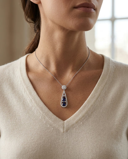 Sapphire And Diamond Tear Drop Pendant In 14k White Gold (si) — editorial close-up