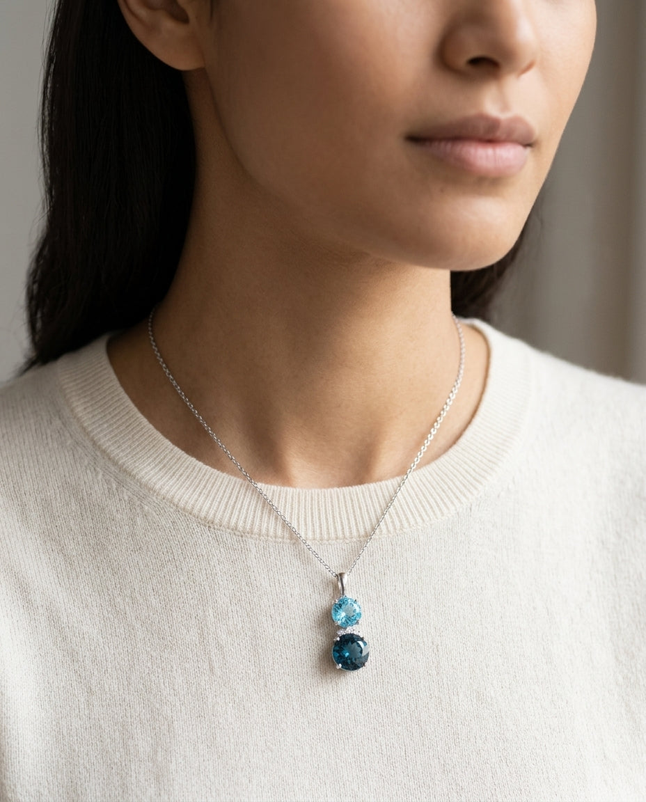 Blue Topaz And Diamond Pendant  In 14k White Gold — editorial close-up