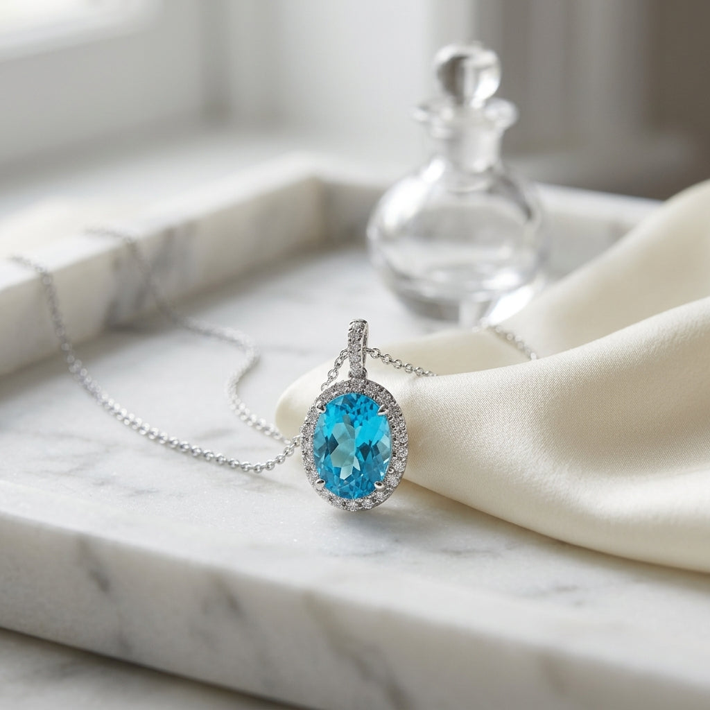 Blue Topaz And Diamond Oval Halo Pendant In 14k White Gold (10x8mm) (hi / Si ) — atelier still life