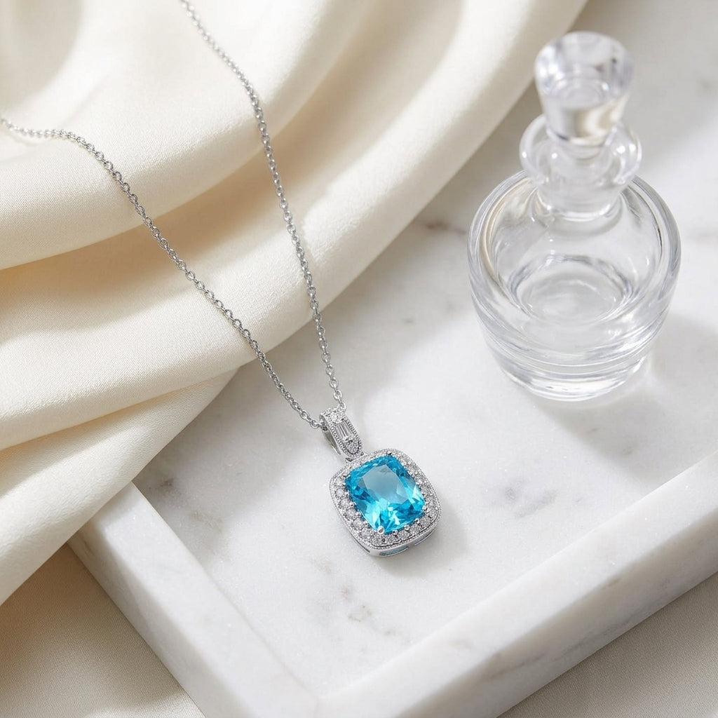 Blue Topaz And Diamond Elongated Cushion Halo Pendant In 14k White Gold — atelier still life