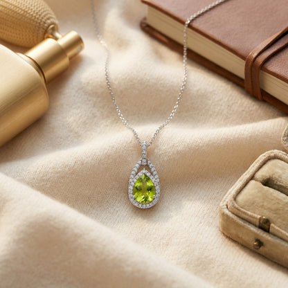 Peridot And Diamond Pendant In 14k White Gold (1/5 Ct.tw.) — textile flat lay