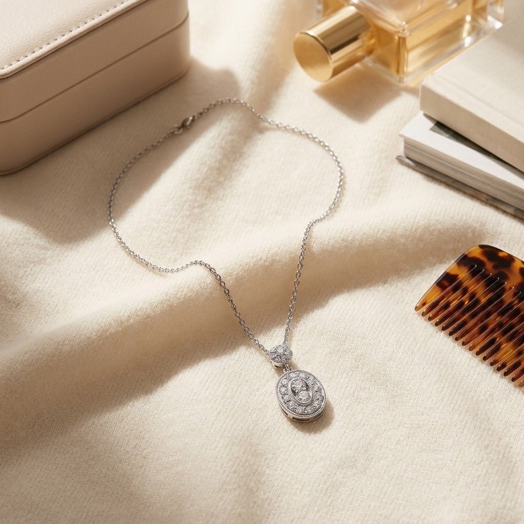 Diamond Oval Halo Dangle Pendant in 14k White Gold, 17 Inch Chain (1/3ctw) — textile flat lay