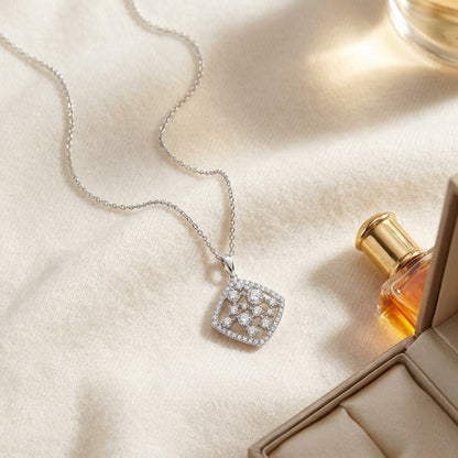 Floating Diamond Round Pendant with Diamond Shaped Border in 14k White Gold (2/3 Ct.tw.) — textile flat lay
