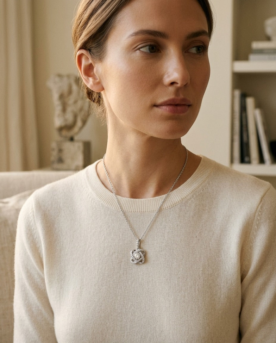 Diamond Pave Cross Knot Pendant with Round Center in 14k White Gold — portrait close