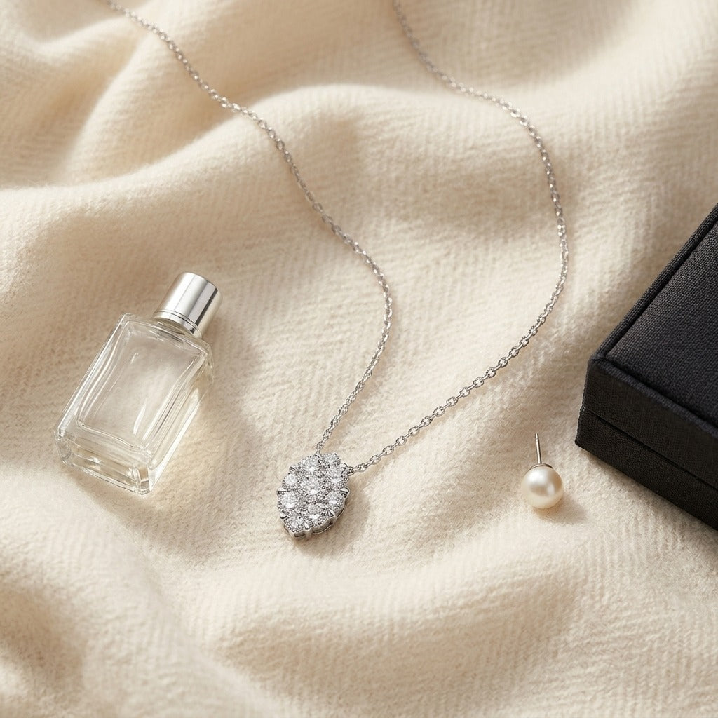 Diamond Oval Cluster Solitaire Pendant in 14k White Gold (16-18 Inch Adj Chain) — textile flat lay