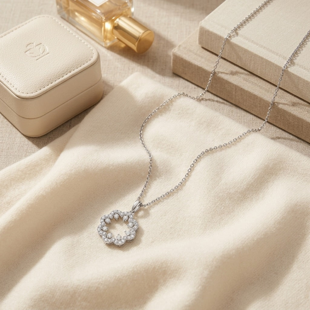 Diamond Floral Pendant in 14k White Gold 1-1/6ctw 16-18 Inch Adj Chain — textile flat lay