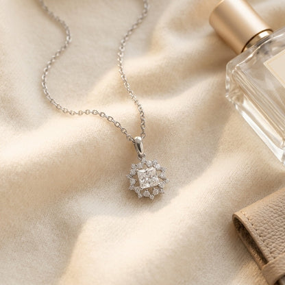 Diamond Floral Pendant in 14k White Gold Cz Ctr 1/5ctw 16-18 Inch Adj Chain — textile flat lay
