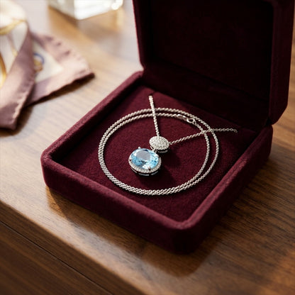 Blue Topaz Oval & Diamond 1/16ctw Pendant Set in 14k White Gold with Chain — velvet box